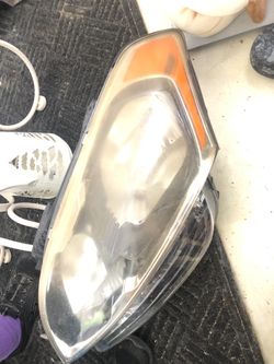 KIA HEADLIGHT FIXTURE