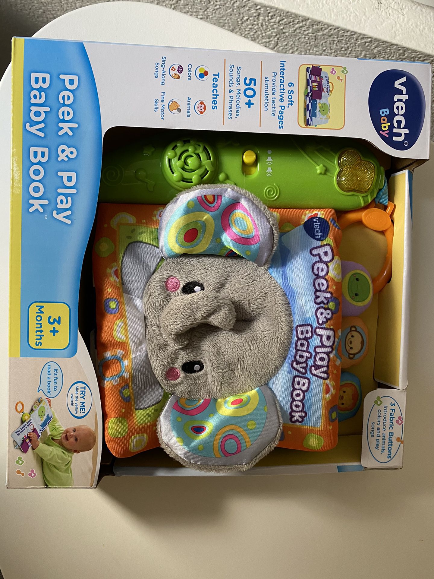 Vtech peek and play baby book