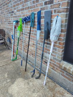 Lot of Cleaning Tools Mops and Brooms