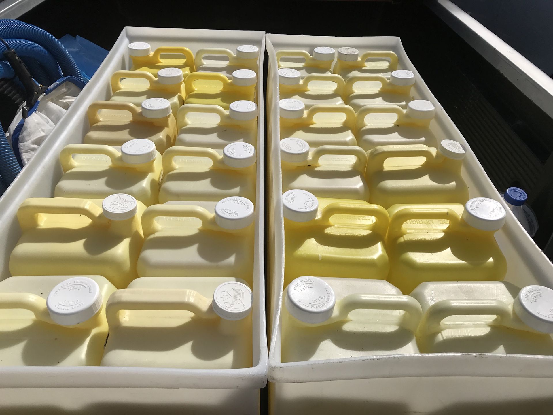 pool chlorine jugs and large bins