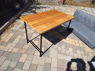 Wood topped steel leg table 43" x 27.5"
