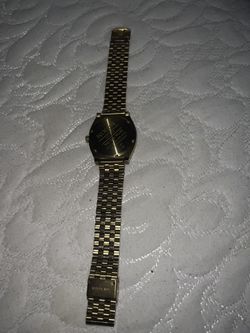 Nixon gold watch