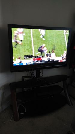 55"TV with base good condition