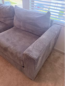 Living spaces corduroy grey / green loveseat