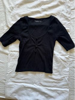 7 item bag of S/XS woman’s clothes