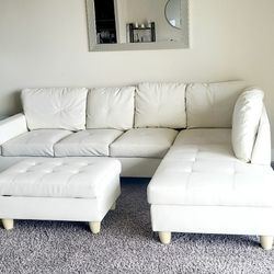White Sectional With Ottoman With End Tables And Lamps 