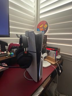 Ps5 disc edition bundle with an additional terabyte of internal storage (2 TB total), two controllers, headphones, headphone holder, and metaphor game