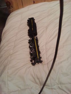 Lionel Steam Engine And Tender 