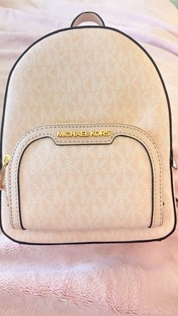 light pink michael kors mini backpack