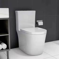 New in Box Small compact one-piece toilet dual flush 23 "short depth Toilet in Oval Seat Included