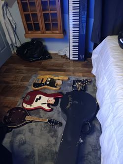 One keyboard no chords 2 Fisher guitars no next A band o case Make offer Plus a lot of guitar parts