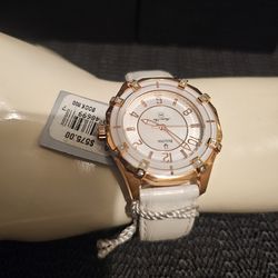 NEW NICE LADIE'S LUXURY GOLD TONE WITH WHITE LEATHER BAND ORIGINAL BULOVA WATCH.