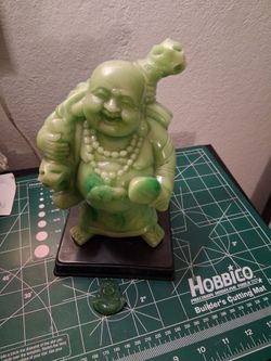 Statue and pendant