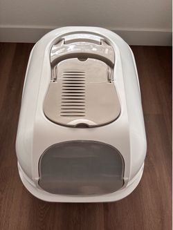 Covered cat litter box