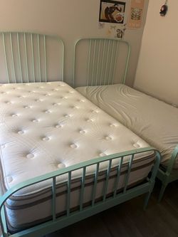 Two twin bed frames