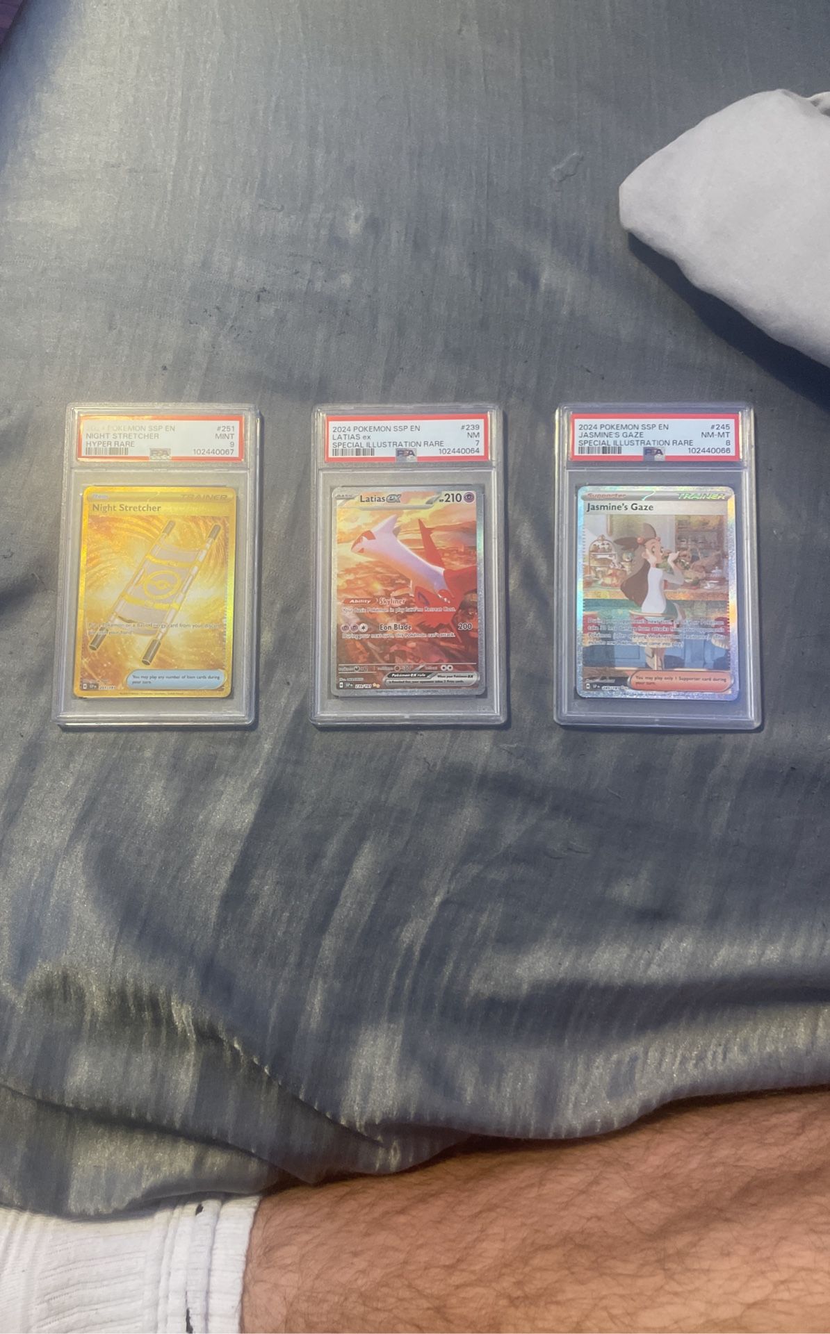 Surging Sparks PSA Pokemon Cards.