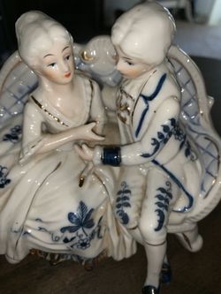 Antique porcelain statue