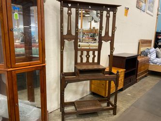 Vintage Wooden Coat Rack with Ornate Ram Hooks and Unique Carved Wood Details