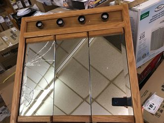1/4 price, medicine cabinet, never used, only one crack mirror