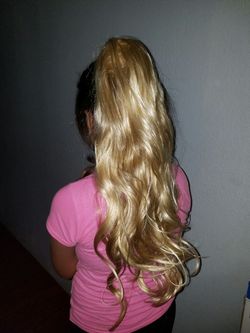 Designer hair clip in draw string ponytail