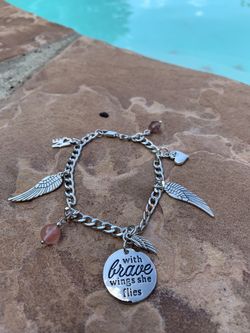 With brave Wings she flies Charm Bracelet