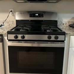 (Pick Up Only) Stainless Steel General Electric Gas Stove and Range microwave to match $375 for both