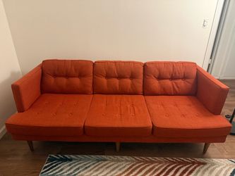 Mid-century orange sofa