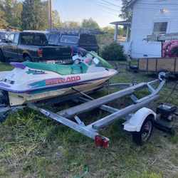 Three seater Sea-Doo and 12 foot aluminum boat