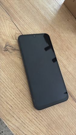 Barely used, new. Samsung galaxy 15 phone