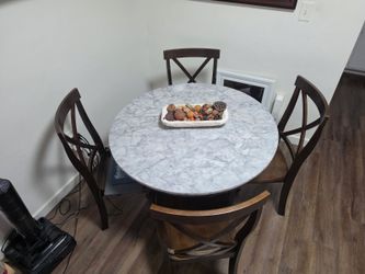 Set de comedor de madera con 4 sillas