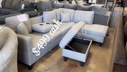 sectional with ottoman $499