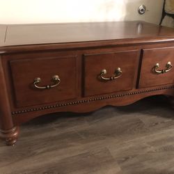 Coffee table by Bassett with 3 deep drawers.