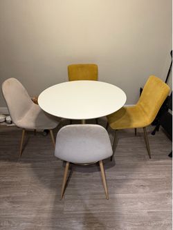 Round dining table and chairs