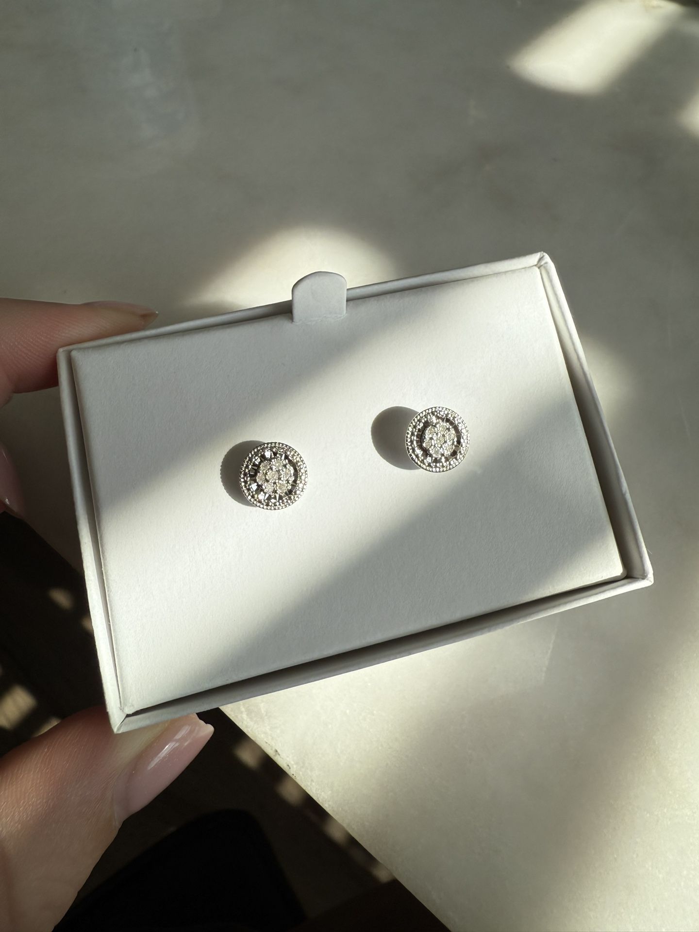 1/10 ct. t.w. Diamond Earrings in Sterling Silver