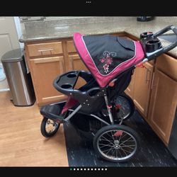 Stroller/Jogger-Baby Trends.         (G)