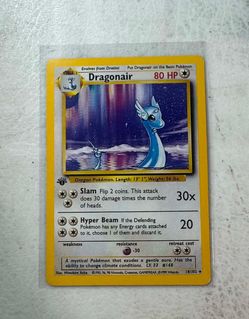 1999 Pokémon TCG Base Set Dragonair (#18) featuring a first-edition stamp.