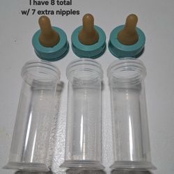 BOTTLE FEEDING WITH NIPPLES 60 mL / 2 oz
