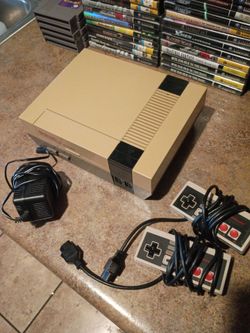 Nintendo NES system with two controllers and power supply fully tested and works $55