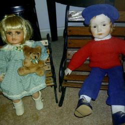 Porcelain Boy And Girl Dolls