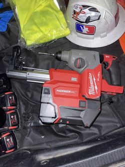 milwaukee Rotary hammer and vac
