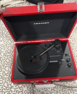 Crosley model CR8005D-RE portable record player.