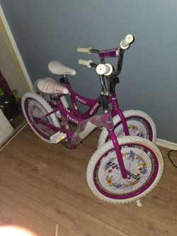 Two pink/white Fenix bikes