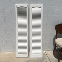 TWO WHITE SHUTTERS