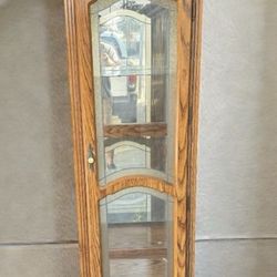 Ornate  wood display / curio cabinet w/drawer & light.