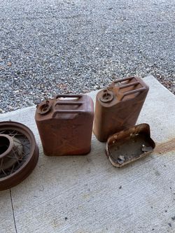 Antique Wheels And Gas Can