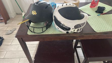 2 youth sports helmets