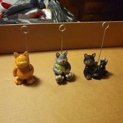 Three cat picture holders