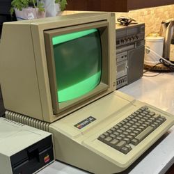 Vintage Apple IIe Computer With Monitor And Floppy Drive