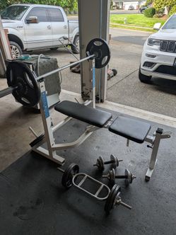Weight bench, bar, and weights