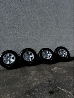 4 OEM Chevy 17” Wheels + Bridgestone 265/70R17 Tires